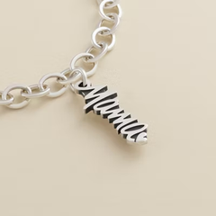 "Mama" Charm